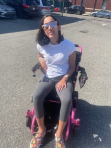 Alexis in her wheelchair, May 2023.