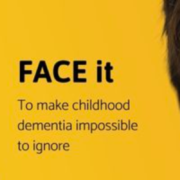 The background is bright yellow. On the left is a child with blue face paint. To the right is another child, who has red, white, and black face paint on, Between the children, the text reads, 'FACE it To make childhood dementia impossible to ignore'.