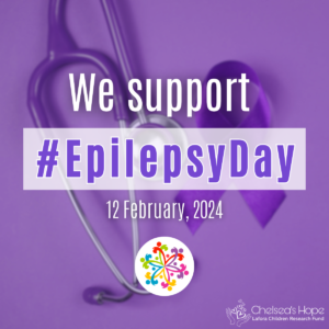 This image has a purple background photo of a purple stethoscope and purple ribbon. White text says 'We support' then purple text on a semi-transparent white background says '#EpilepsyDay.' Below, white text says '12 February, 2024.' The Epilepsy Day logo on a white circle is beneath all the text. The white Chelsea's Hope Lafora Children Research Fund logo is in the bottom right hand corner. 