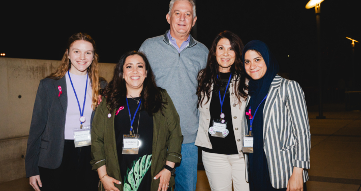 Five members of the Chelsea's Hope Board of Directors smiling and standing together.