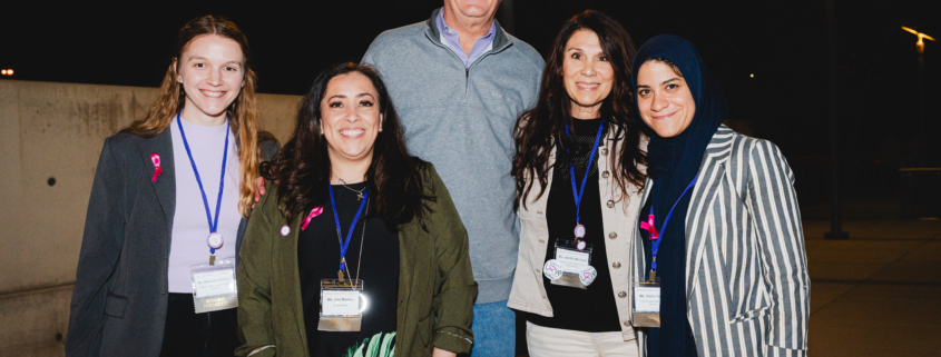 Five members of the Chelsea's Hope Board of Directors smiling and standing together.