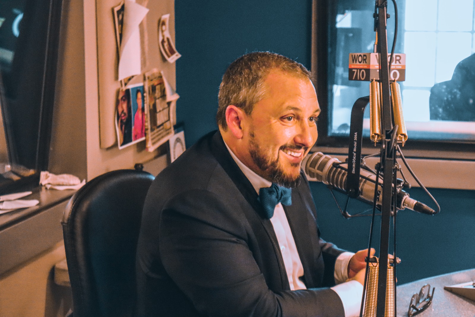 Dr. Sean Hall speaking into a microphone